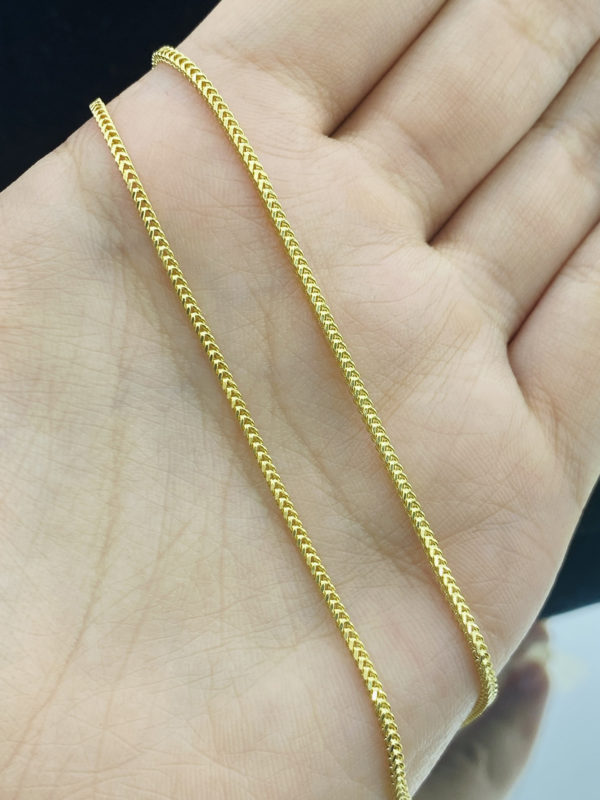 Cadena de espiga para dama, oro de 18k