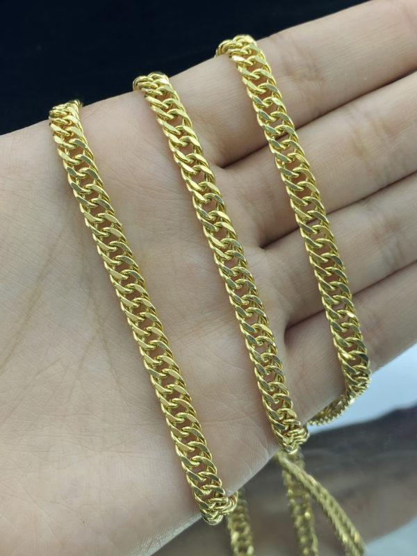 Cadena doble curva para caballero, oro de 18k.